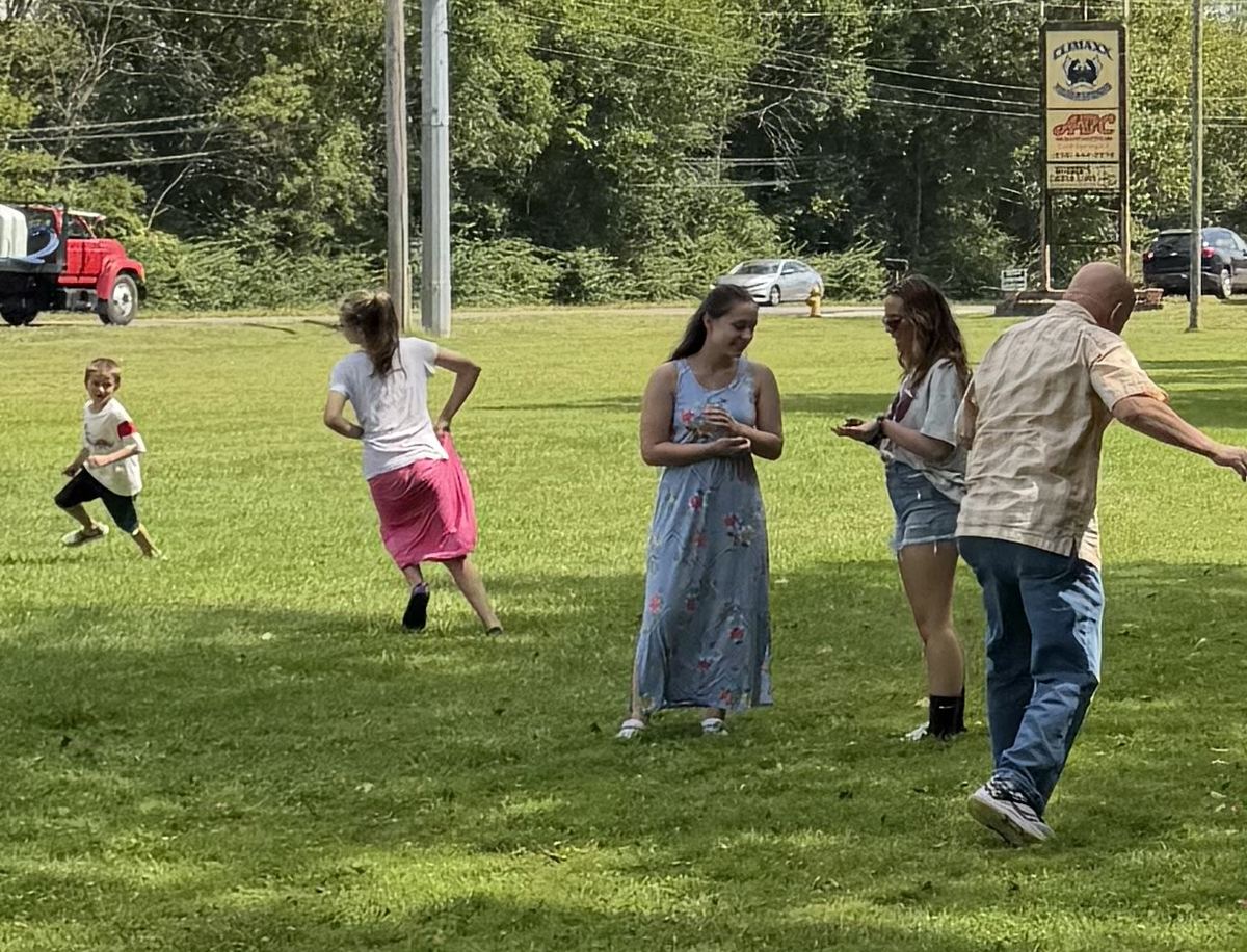 Kids ministry outdoor game with rainbow beach balls